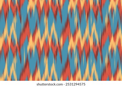 Seamless Ikat fabric pattern in vibrant red, yellow and blue tones inspired by traditional weaving techniques. Perfect for cushions, fabrics and wallpapers.