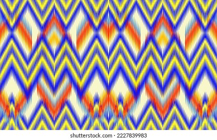 Patrón de tela de ikat sin soldadura.Patrón de tejido étnico abstracto.Fondo textil.Patrón tribal geométrico colorido.Ilustración de bordado,alfombra, papel pintado, ropa, envoltura, patrón de ropa de punto.Zigzag 