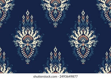 Seamless Ikat floral pattern on navy blue background vector illustration.Ikat ethnic oriental embroidery.Aztec style,abstract background.design for texture,fabric,clothing,wrapping paper,decoration.