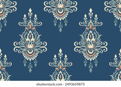 Seamless Ikat floral pattern on blue background vector illustration.Ikat ethnic oriental embroidery.Aztec style,abstract background.design for texture,fabric,clothing,wrapping paper,decoration,print.