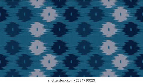 Seamless ikat , geometric and tribal pattern on blue background
