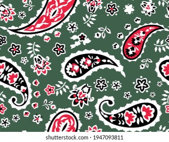 seamless ikat paisley pattern on green