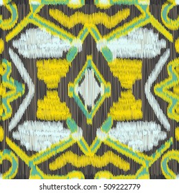 Seamless Ikat Pattern with a geometrical ornament . Abstract  background for textile design, wallpaper, surface textures, wrapping paper.