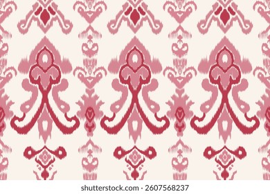Seamless Ikat pattern with tribal and Aztec geometric embroidery in pink and red tones. Ideal for textile design, rugs, wallpaper, gift wrapping, and home decor.
