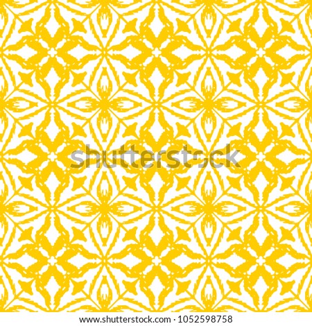 Seamless ikat pattern in yellow and white colors. Vector tribal background. Ethnic print for wallpaper, textile, clothing, web, scrapbooking design