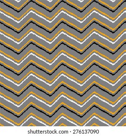 Seamless Ikat pattern with zigzag lines 