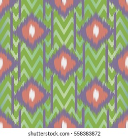 Seamless ikat textile pattern .Geometric abstract shapes . Traditional pattern on the fabric in Asian countries