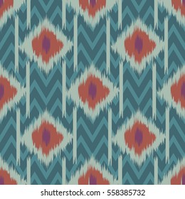 Seamless ikat textile pattern .Geometric abstract shapes . Traditional pattern on the fabric in Asian countries