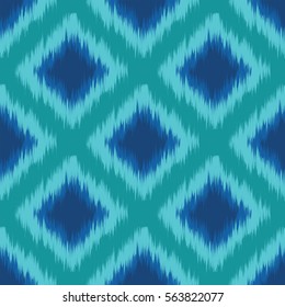 Seamless ikat textile pattern .Geometric abstract shapes . Traditional pattern on the fabric in Asian countries