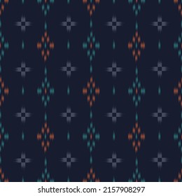 seamless ikat and tribal pattern on black background