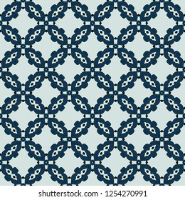 Seamless illustrated pattern made of abstract elements in light gray and shades of blue