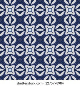 Seamless illustrated pattern made of abstract elements in light gray and shades of blue