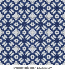 Seamless illustrated pattern made of abstract elements in light gray and shades of blue