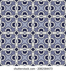Seamless illustrated pattern made of abstract elements in white and shades of blue