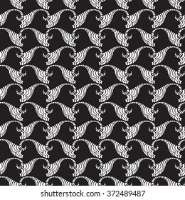 Seamless illustrated pattern made of abstract white elements on black