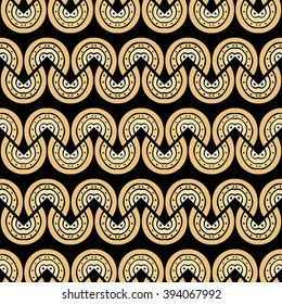 Seamless illustrated pattern made of abstract gold elements on black