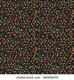 Seamless illustrated pattern made of colorful hand drawn elements on black