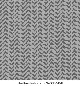 Seamless illustrated pattern made of grey hand drawn elements on light grey