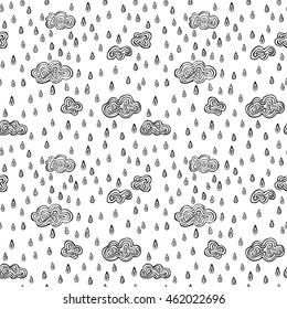 Seamless illustrated pattern made of hand drawn raindrops and clouds