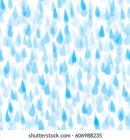 Seamless illustrated pattern made of hand drawn blue rain drops