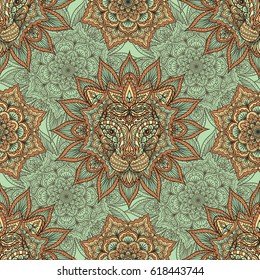 Seamless indian background with mandala and lion head