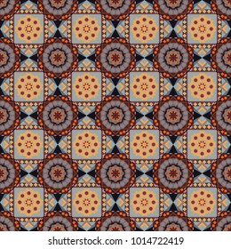 Seamless Indian motif in orange, brown and gray colors. Ornamental floral print on wallpaper, linoleum, textile. Vector pattern with Mandalas, flower paisley.