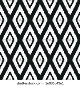 Seamless inverse black and white vintage ikat diamonds outline textile pattern vector