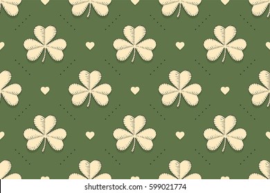 Seamless irish green pattern with clover and heart on green background. Pattern for St. Patrick Day. Old school hand-drawn design in engraving style for wrapping paper, background. Vector Illustration