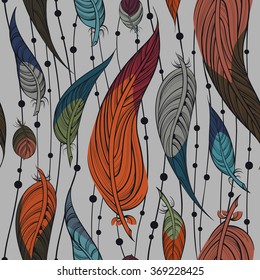 Seamless isolated pattern with colorful feathers. Native american indian dream catcher, traditional symbol.