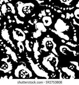 Seamless jaguar pattern. Wildlife background. Animal fur design. Snow leopard background. Camouflage pattern. Black and white vector illustration.