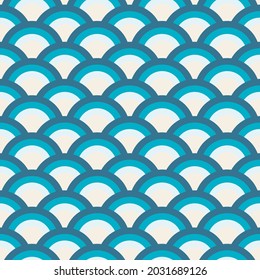 Decoración art déco sin fisuras en tonos azules para telas modernas, tejidos de moda, almohadas decorativas. Muchos círculos multicolores están apilados como escamas. Vector.