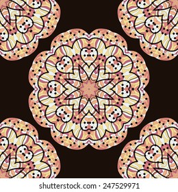 Seamless kaleidoscopic mandala unusual design. Round motif background.