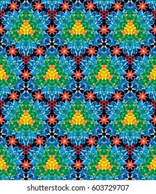 Seamless kaleidoscopic pattern with the imitation of colored glass
