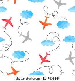 Seamless kid pattern with watercolor planes and clouds.