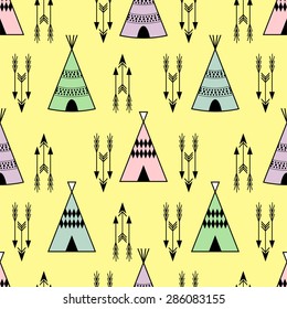 Seamless kids wigwam illustration with arrows. Cute indian colorful background pattern in vector. Baby style print.  Baby shower design. Bright childish card. Travel concept background.