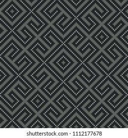 Seamless knitted Old Russian national woolen pattern. Gray Worm Labyrinth