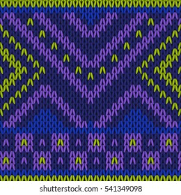 Seamless knitted pattern in bright colors. Ethnic style.