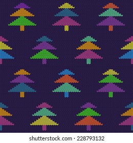 Seamless knitted pattern with colorful Christmas trees