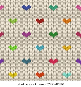 Seamless knitted pattern with colorful hearts