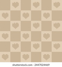 seamless knitted pattern with cream color and brown color hearts.