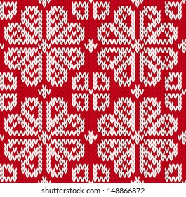 Seamless knitted pattern with flowers. EPS8