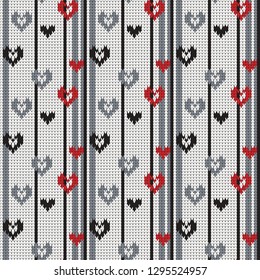 Seamless knitted pattern with hearts and vertical stripes
