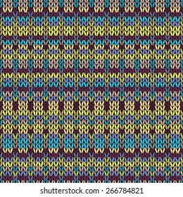 Seamless knitted pattern. Multicolored repeating tribal template