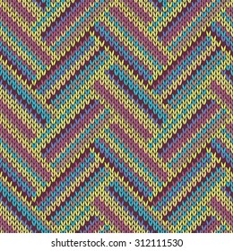 Seamless knitted pattern. Multicolored repeating tribal template