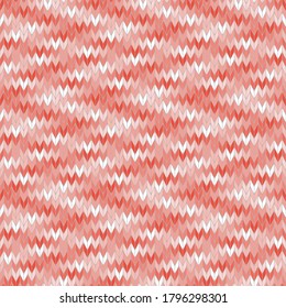 Seamless knitted pattern of pink and white. Handmade knitted textile imitation. Abstract geometric background