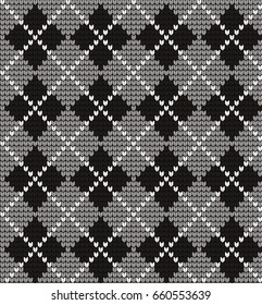 Seamless knitted pattern in rhombuses