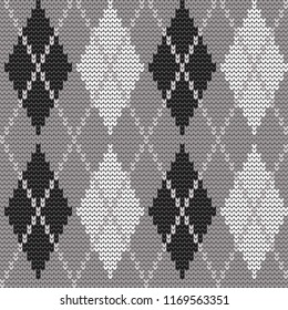 Seamless knitted pattern with rhombuses. Argyle print. Checkered background in gray, black and white colors. Vector illustration