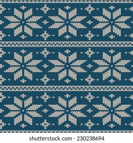 Seamless knitted pattern. Scandinavian ornament with snowflakes