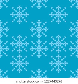 Seamless knitted pattern with Snowflakes. A warm sweater. Christmas pattern. Can be used for wallpaper, textile, invitation card, wrapping, web page background.