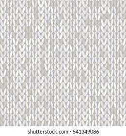 Seamless knitted pattern in style with bright colors. Beige and gray shapes.